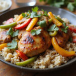 Completed Poulet Basquaise dish with vegetables and herbs, perfect for a French-inspired meal.
