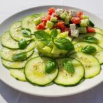 Finished carpaccio de melon and courgette garnished, a delightful summer dish.