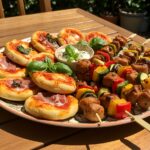 A delightful spread of mini pizzas and colorful summer brochettes, perfect for summer appetizers.