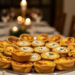 Assorted mini-quiches displayed for serving, perfect for a quick appetizer or festive gathering.