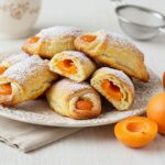 Finished Oranais abricot with golden crust and apricot filling, ideal for a sweet treat.