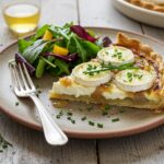 Finished tarte oignons chèvre miel served elegantly, highlighting the sweet and savory flavors for a delightful meal.