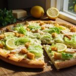 Finished pizza de salade césar on a wooden table, perfect for sharing.