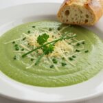 Delicious bowl of crème de brocoli au fromage, a perfect comforting soup for cold days.